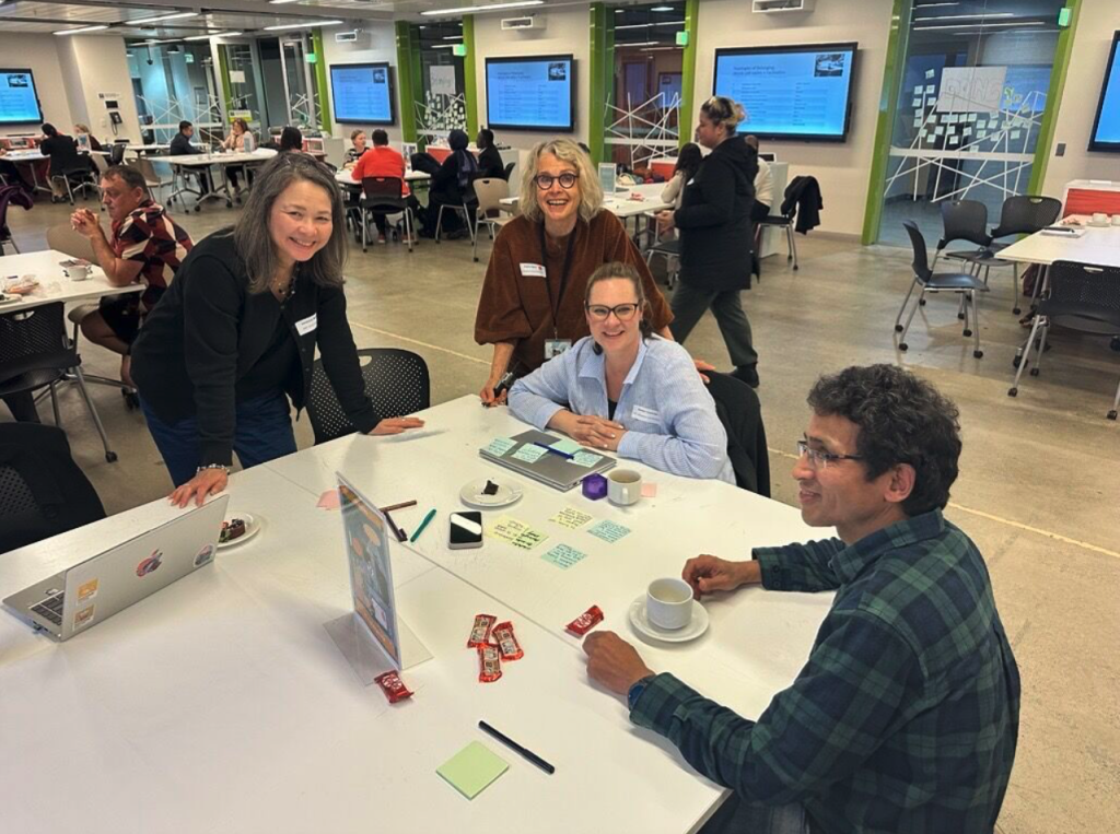 Staff collaborating world-café-style at the FFYE Forum
