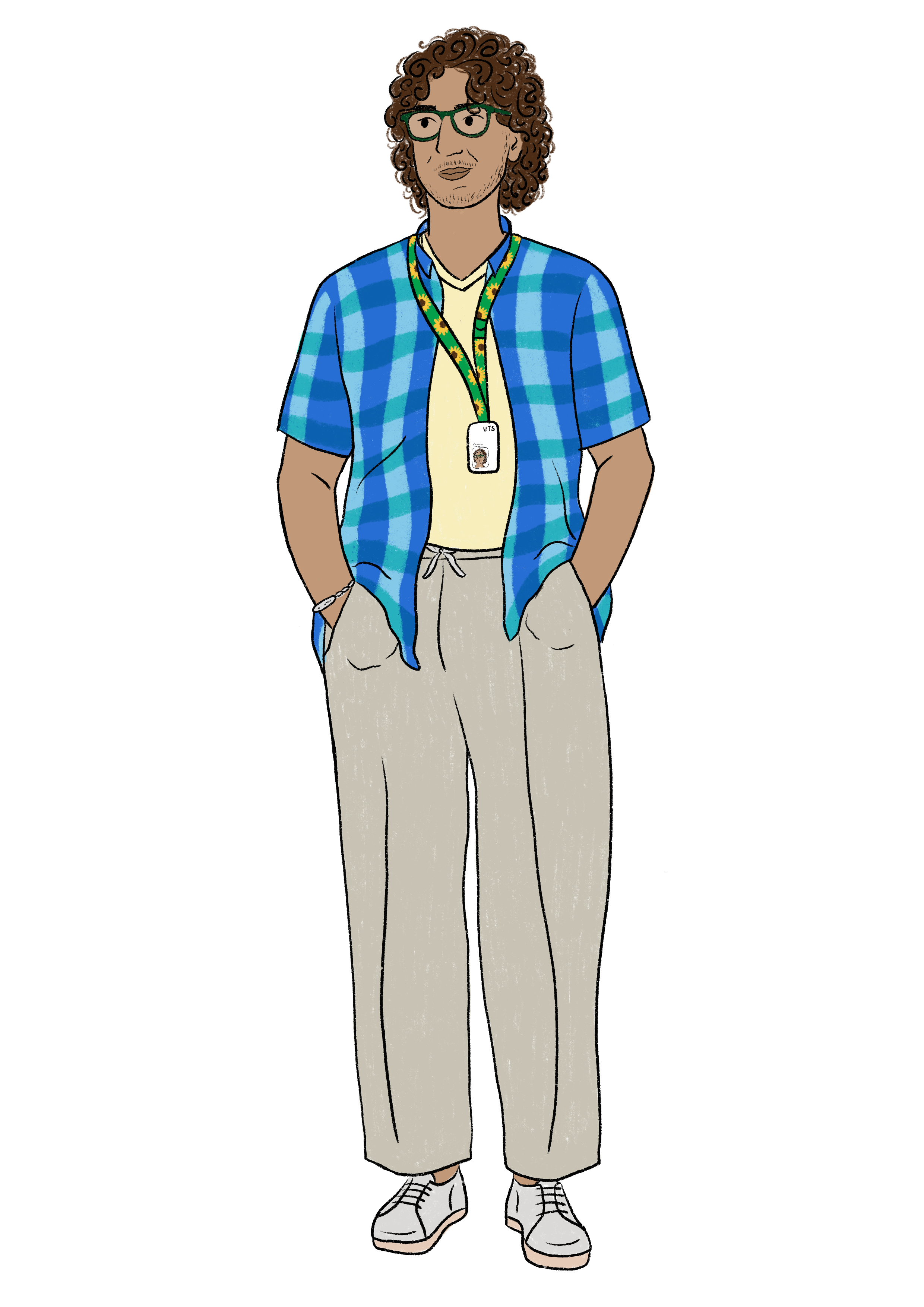A man with medium curly brown hair and olive skin tone wears glasses and has a sunflower lanyard around his neck. He is dressed in a yellow T-shirt under a blue plaid shirt, green trousers, and light grey sneakers. 