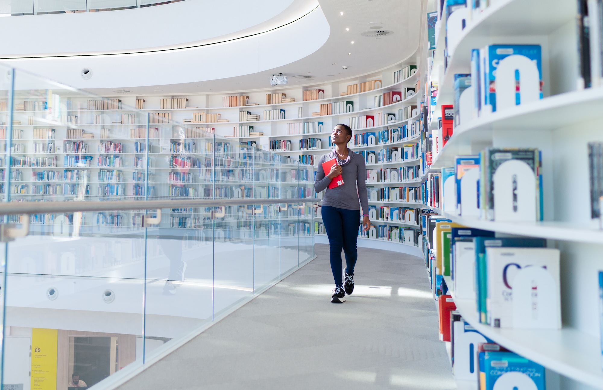woman walking in UTS library