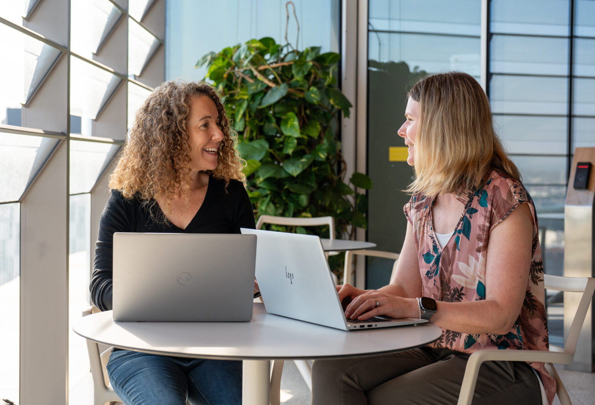 Academics talking at table